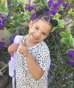 Ava Zaria Lee with flower