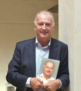 Trevor Francis with a book